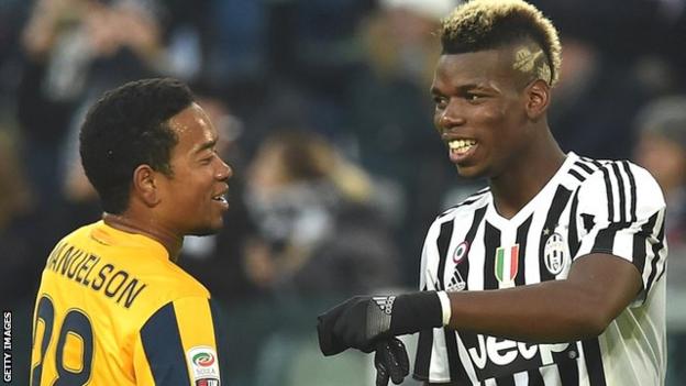 Urby Emanuelson (left) playing for Verona against Paul Pogba of Juventus