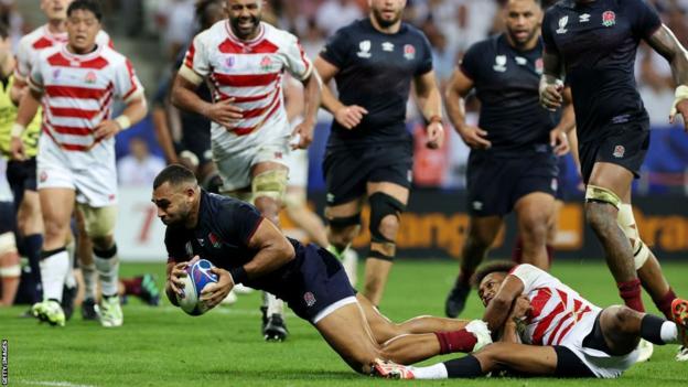 Joe Marchant scores England's fourth try in the win over Japan