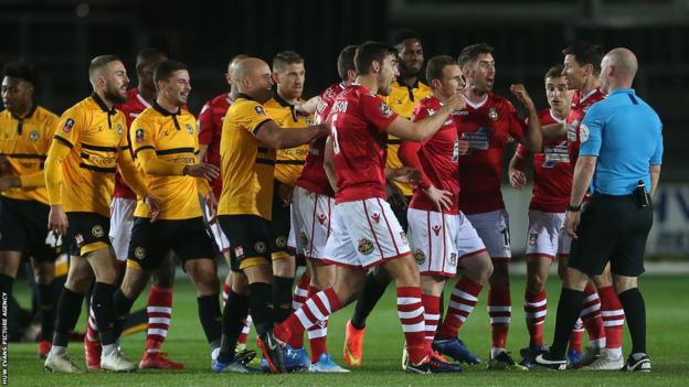 Tensions rise during Newport's FA Cup replay victory over Wrexham in 2018, in which Luke Young was sent off early on