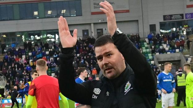 David Healy acknowledges the Linfield supporters after beating Coleraine in the decider