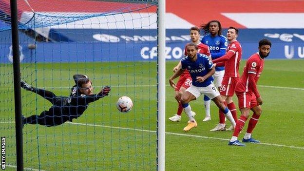 Dominic Calvert-Lewin heads in to bring Everton level at 2-2 with Liverpool in the Merseyside derby