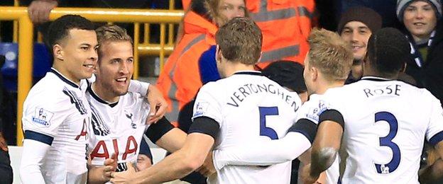 Harry Kane (second from left) celebrates with team-mates