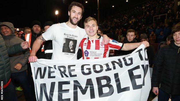Ollie Palmer and Harry Anderson celebrate Lincoln City's victory over Chelsea in the EFL Trophy semi-finals