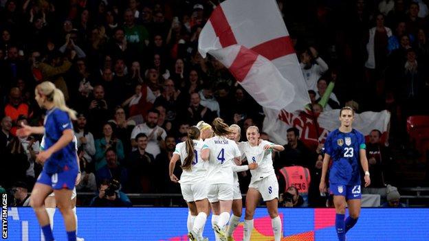 England celebrate the victory over the USA