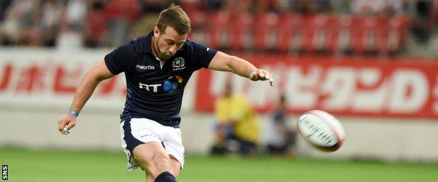 Greig Laidlaw kicks for Scotland