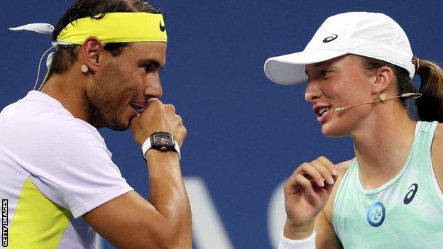 Iga Swiatek chats to Rafael Nadal during the 'Tennis Plays for Peace' exhibition event at the US Open