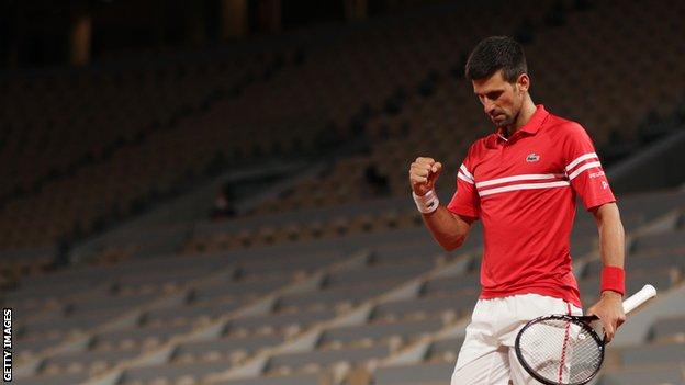 Novak Djokovic celebrates winning a point