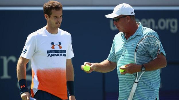 Ivan Lendl hands Andy Murray a tennis ball