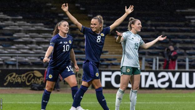 Sam Kerr celebrates making it 2-0 to Scotland at Dens Park