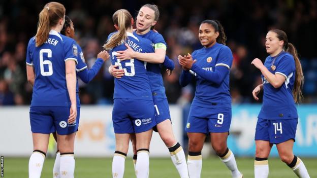 Chelsea celebrate after Aggie Beever-Jones scores against Aston Villa