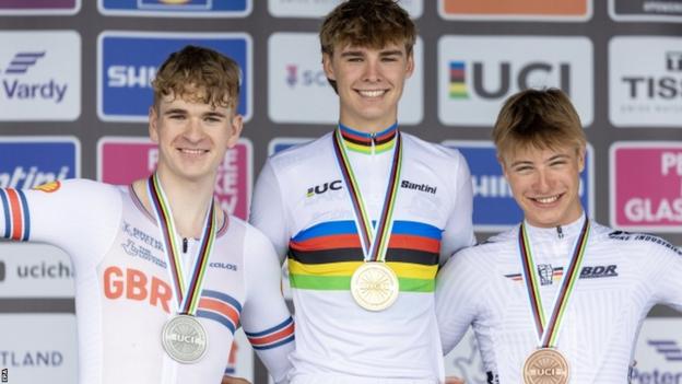 Ben Wiggins, Oscar Chamberlain and Louis Leidert on the podium after the Men's Junior Individual Time Trial at the 2023 Cycling World Championships