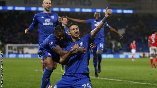 Marko Grujic celebrates scoring a goal with Kadeem Harris of Cardiff City in their 2-1 win over Barnsley.