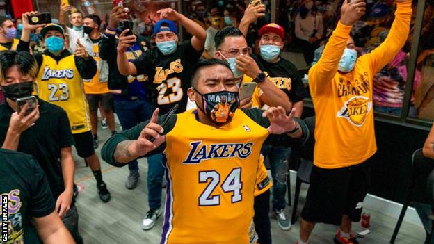Kobe Bryant Fans Pay Tribute With Lakers Jerseys And Sneakers