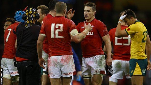Wales centres Hadleigh Parkes and Jonathan Davies savour a rare win over Australia