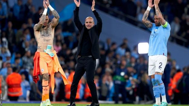 Pep Guardiola celebrates with his players after Manchester City beat Real Madrid
