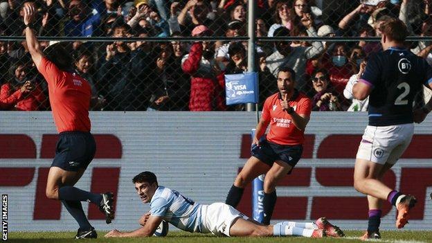 Argentina's Santiago Carreras scores a try