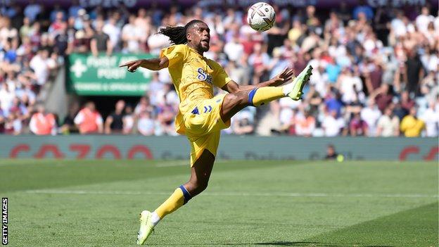 Alex Iwobi in action against Aston Villa