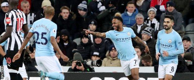 Raheem Sterling celebrates Manchester City's opener