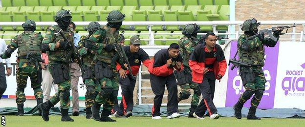 The Bangladesh Army performs a drill to evacuate players