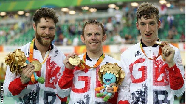 Jon-Allan Butterworth, Jody Cundy and Louis Rolfe pose with gold medals