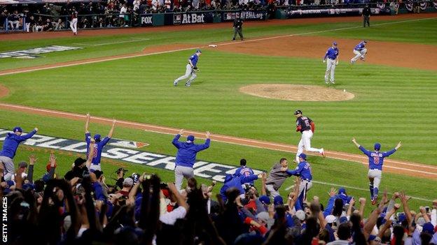 Chicago Cubs players and fans celebrate