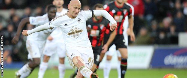 Jonjo Shelvesy scores from the penalty spot for Swansea
