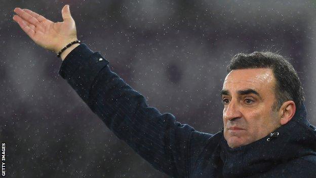 Swansea manager Carlos Carvalhal makes a point