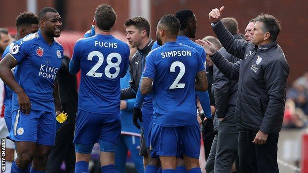 Claude Puel (right) with his Leicester players