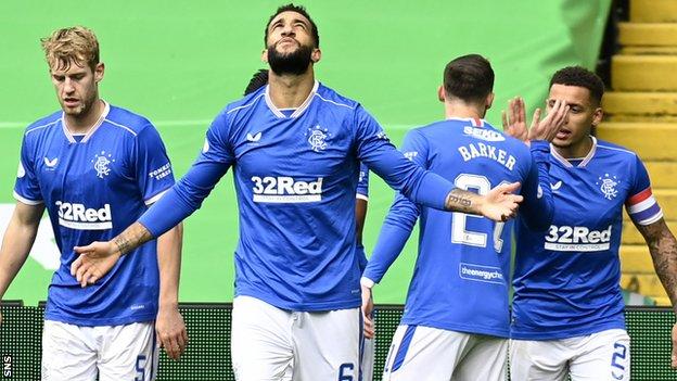 Connor Goldson (centre) celebrates one of his Rangers goals