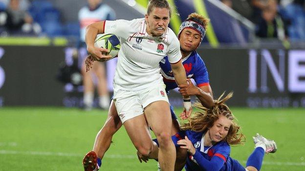 Claudia MacDonald playing for England against France