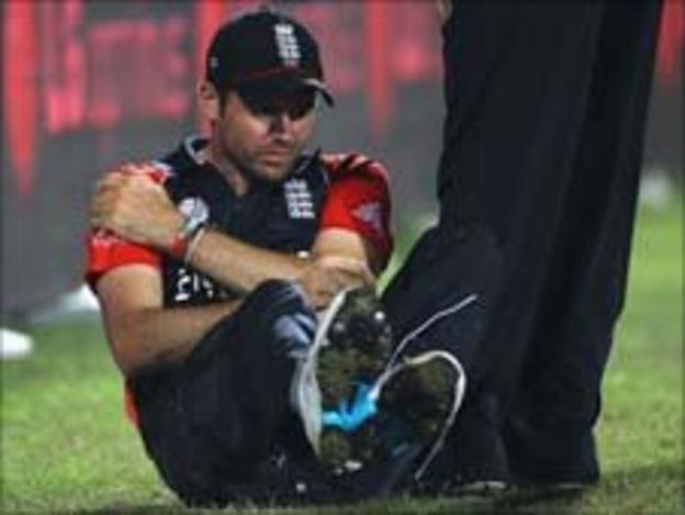 James Anderson holds his shoulder during the match against Bangladesh