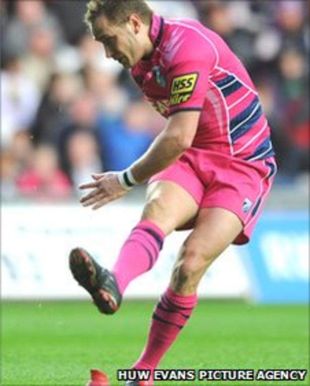 Blues fly-half Dan Parks takes a shot at goal against the Ospreys