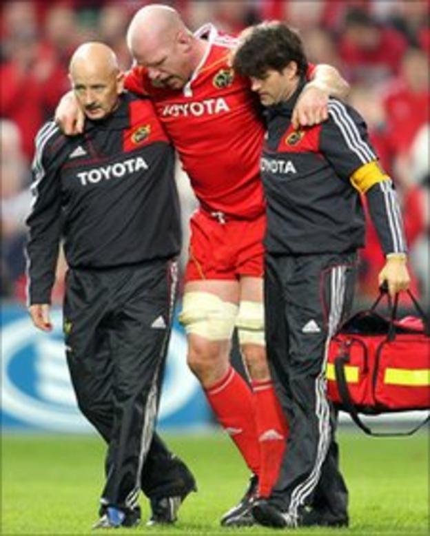 Paul O'Connell is helped off the field at Thomond Park