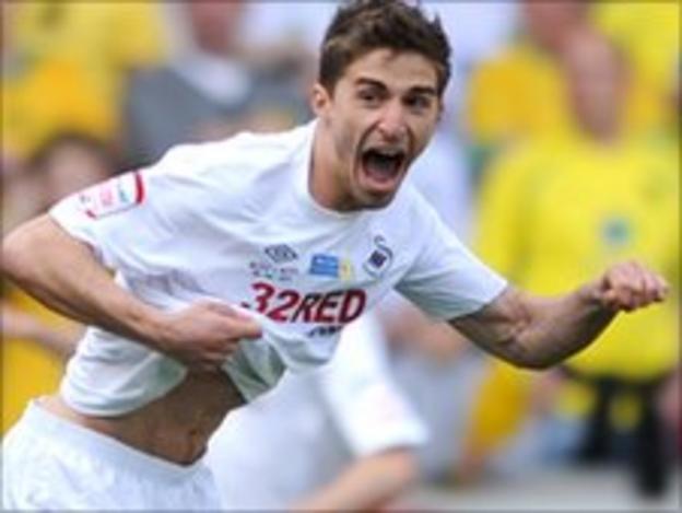 Swansea City striker Fabio Borini celebrates after scoring against Norwich