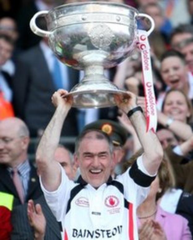 Mickey Harte lifts the Sam Maguire Cup after winning the 2008 final