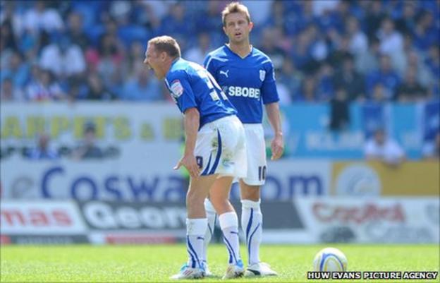 Craig Bellamy bellow orders against QPR as Stephen McPhail looks on