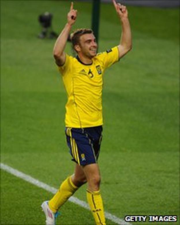 James Morrison celebrates after scoring Scotland's equaliser