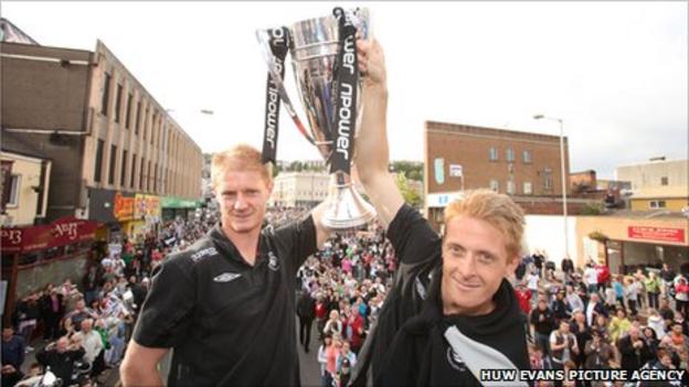 Alan Tate and Garry Monk celebrate Swansea's play-off victory
