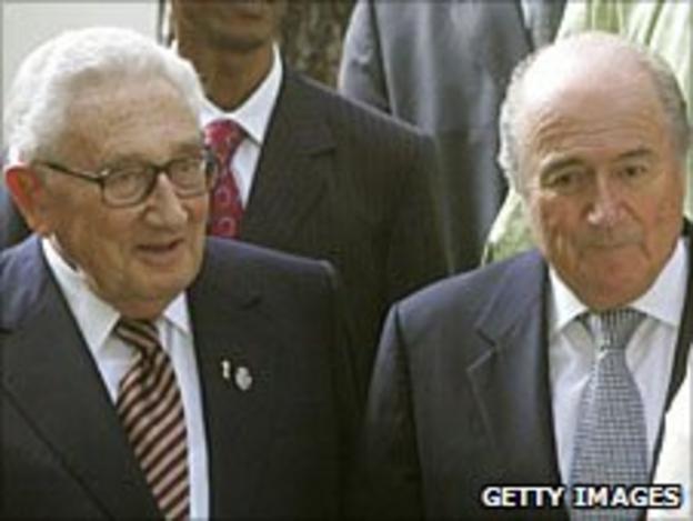 Kissinger (left) and Sepp Blatter (right)