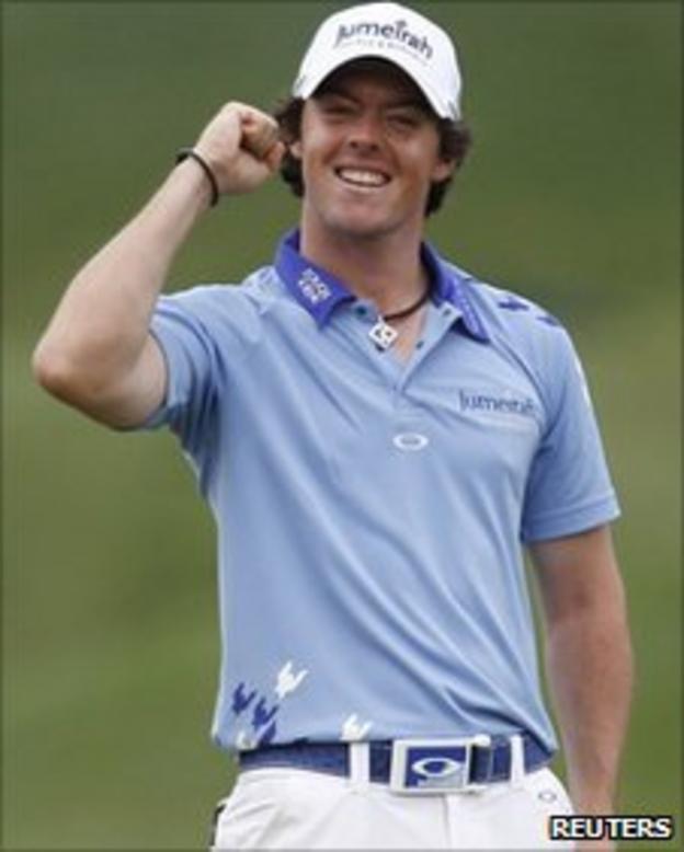 Rory McIlroy celebrates at the 18th after winning the US Open