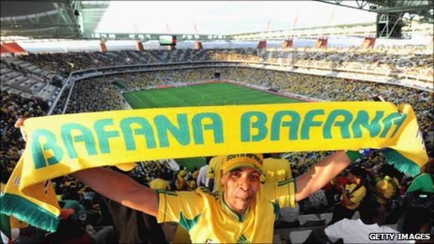 A South African supporter waves a Bafana Bafana scarf