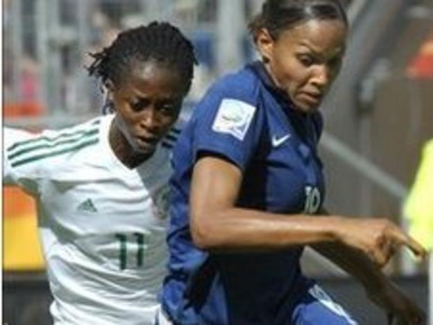 France's Marie-Laure Delie (right) in action against Nigeria's Glory Iroka