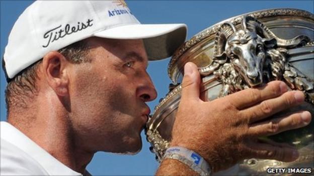 Thomas Levet kisses the French Open trophy
