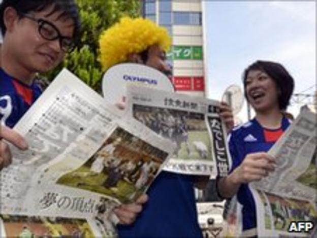 Fans read about Japan's World Cup final win