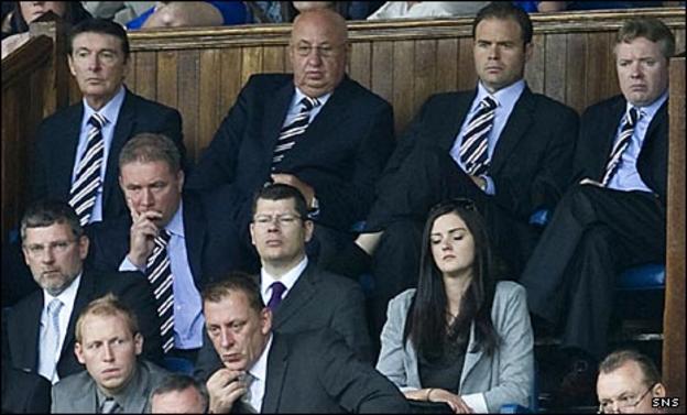 Ally McCoist and the Rangers directors look concerned