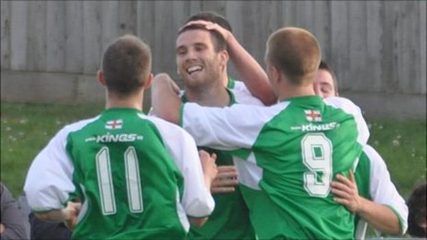 Guernsey footballer Ross Allen celebrates the first of his three goals