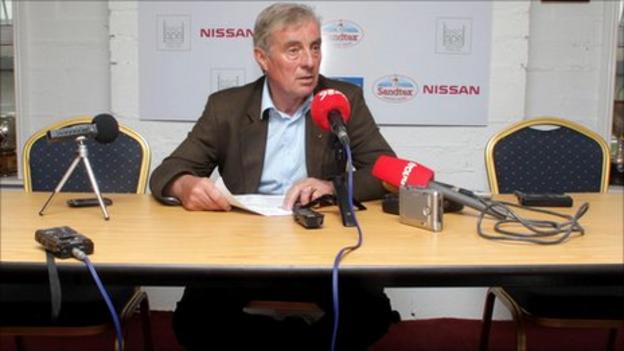 St Pat's boss Pete Mahon sits alone at a press conference after players refused to be involved in media activities