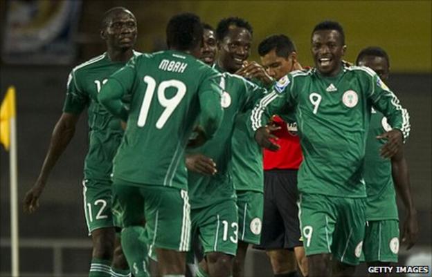 Olarenwaju Kayode (number 9) and his team-mates celebrate