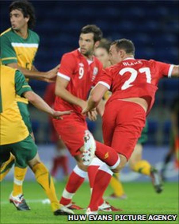 Darcy Blake heads his first goal for Wales