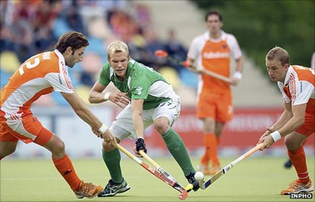 Rogier Hofman and Billy Bakker of the Netherlands close in on Ireland's Conor Harte